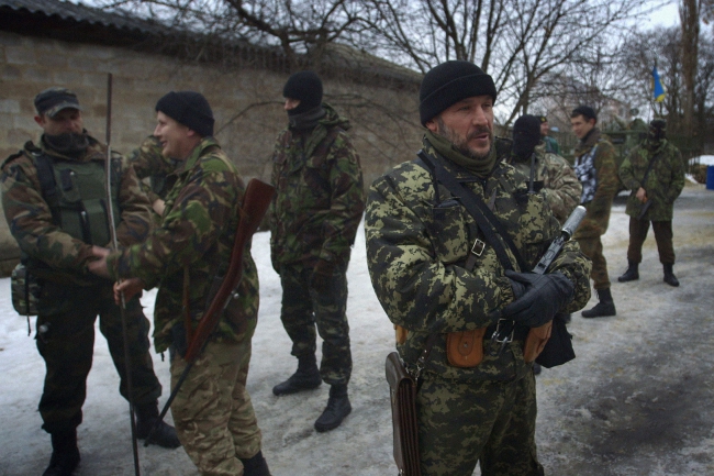 Иса Мусаев и другие мусульманские боевики в Украине в январе. Фото: Tomasz Glowacki