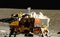 The rover Yutu-2 (Jade Rabbit-2) shows the lander of the Chang'e-4 probe. Photo by China National Space Administration/Handout via Xinhua.