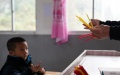 Teaches his student in a lesson at School in Xiongcun Township, east China's Jiangxi Province. Photo by Xinhua/Hu Chenhuan.

