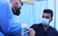 A medical worker receives a dose of China-donated COVID-19 vaccine in Baghdad, Iraq, March 2, 2021. (Xinhua/Khalil Dawood).