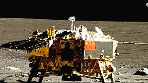 The rover Yutu-2 (Jade Rabbit-2) shows the lander of the Chang'e-4 probe. Photo by China National Space Administration/Handout via Xinhua.