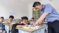 China's progress in eliminating illiteracy. Photo by Xinhua.