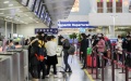 Passengers check in at the domestic departure section of Terminal 2 building of the Shanghai Pudong International Airport in east China's Shanghai. Photo by Xinhua/Ding Ting.