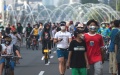 Local residents walk in a street in China. Photo by Xinhua.