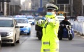A traffic police officer directs traffic in Lanzhou, northwest China's Gansu Province. Photo by Xinhua.