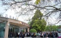 People wait to be admitted in front of the tourist service center at the Sanxingdui Museum in Guanghan City, southwest China's Sichuan Province. Photo by Xinhua/Liu Mengqi.