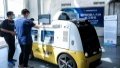 Beijing Economic-Technological Development Area shows an unmanned delivery vehicle displayed in Beijing. Photo by Xinhua.