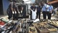 Campaign to seize illegal guns and explosives. Photo by Xinhua.


