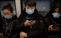 China's mobile internet users. Photo by Xinhua.

