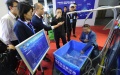 A staff member demonstrates a seawater desalination facility. Photo by Xinhua/Feng Weimin.

