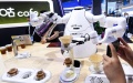 An AI-powered robot brews coffee. Photo by Xinhua/Yang Wenbin.

