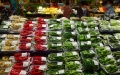 People buy vegetables at a supermarket in Wuxi, east China's Jiangsu Province. Photo by Huan Yueliang/Xinhua.