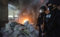 Police in Lincang, Yunnan province, destroy drugs. Photo by Xinhua.