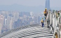 Workers brave the summer heatwave while building a skyscraper in southwest China's Chongqing Municipality. Photo by Xinhua/Wang Quanchao.