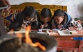 Students take an online class at home in a village in Damxung County, southwest China's Tibet Autonomous Region. Photo by Xinhua/Purbu Zhaxi.