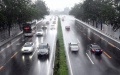 Rain in Haidian District of Beijing, capital of China. Photo by Xinhua/Ren Chao.