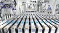 A worker operates on a production line at a lithium battery factory in Tangshan, north China's Hebei Province. Photo by Xinhua/Yang Shiyao.