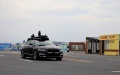 A testing car drives on a road of the Lingang intelligent connected vehicle integrative testing demonstration zone in east China's Shanghai. Photo by Xinhua/Fang Zhe.