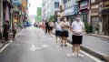 Citizens keep social distance while waiting for COVID-19 nucleic acid testing in Zhangjiajie, central China's Hunan Province. Photo by Xinhua/Chen Sihan.