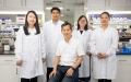Chinese scientists Qiao Jing, Cai Tao, Ma Yanhe, Zhu Leilei, Sun Hongbing (from L to R) at a lab of the Tianjin Institute of Industrial Biotechnology, Chinese Academy of Sciences. Photo by Xinhua/Jin Liwang.