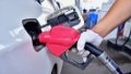 Refueling a car at a gas station. Photo by Xinhua/Jia Minjie.