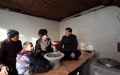 Xi Jinping visits impoverished villagers. Xinhua/Lan Hongguang