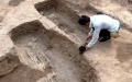 Chinese archaeologists at work. Photo by Xinhua.