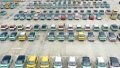 New energy vehicles at a logistics park in Liuzhou, south China's Guangxi Zhuang Autonomous Region. Photo by Li Hanchi/Xinhua.