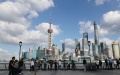 People visit the Bund in east China's Shanghai. Photo Xinhua/Liu Ying.