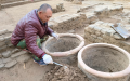An archeologist works at an unearthed ancient winery site in Taocheng District of Hengshui, north China's Hebei Province. Photo by Xinhua.