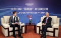 Cui Tiankai (right) talks with Ian Goodrum. WANG ZHUANGFEI/CHINA DAILY