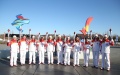 Participants of the Beijing 2022 Olympic Torch Relay pose for a group photo at the Olympic Forest Park in Beijing. Photo by Xinhua/Jia Haocheng.