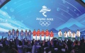 Chinese (center), Italian (left) and Hungarian (right) medal winners of the mixed team relay of short track speed skating celebrate at the award ceremony in Beijing. Photo by Feng Yongbin/China Daily.