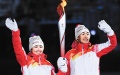 Dinigeer Yilamujiang (left) and Zhao Jiawen, a men’s Nordic combined athlete, at the opening ceremony. Photo by Li Ga/Xinhua.