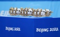 Beijing 2022 mascots Bing Dwen Dwen to be awarded to medalists of the short track speed skating team mixed relay are seen before the awarding ceremony in Capital Indoor Stadium, Beijing. Photo by Xinhua.