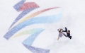 Madison Chock (L) and Evan Bates of the United States perform during the figure skating team event ice dance free dance at Capital Indoor Stadium in Beijing, capital of China. Photo by Xinhua/Ju Huanzong.