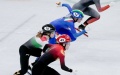 Athletes compete during the mixed team relay final of short track speed skating at Capital Indoor Stadium in Beijing, China. Photo by Xinhua/Wang Yuguo.