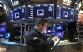 A trader works at the New York Stock Exchange in New York, the United States. Photo by Xinhua/Wang Ying.
