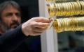 A jeweler is seen at a jewelry store in Ankara, Turkey. Photo by Mustafa Kaya/Xinhua.