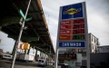 Gas prices are displayed at a gas station in the Brooklyn borough of New York, the United States. Photo by Michael Nagle/Xinhua.