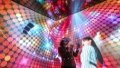 A woman tries the "Metaverse" via VR technology at the Mobile World Congress (MWC) in Barcelona, Spain. Photo by Xinhua/Zheng Huansong.