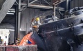 Workers operate equipment to deal with liquid aluminum at an aluminum factory in Baise City, south China's Guangxi Zhuang Autonomous Region. Photo by Xinhua/Cao Yiming.