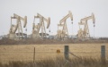 Oil derricks operate in Three Rivers, Texas, the United States. Photo by Nick Wagner/Xinhua.