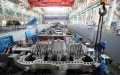 Workers work at a factory of Harbin Turbine Company Ltd. of Harbin Electric Corporation. Photo by Xinhua/Wang Jianwei.