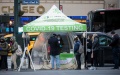 People wait in line at a COVID-19 testing site in New York, the United States. Photo by Michael Nagle/Xinhua.