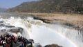 Tourists viewing the scenery of the Hukou Waterfall on the Yellow River in northwest China's Shaanxi Province. Photo by Xinhua/Tao Ming.