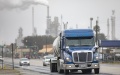 An oil truck drives along a highway after delivering oil to an oil refinery plant in Three Rivers, Texas, the United States. Photo by Nick Wagner/Xinhua.