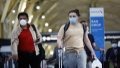 Travelers walk through terminals at Ronald Reagan Washington National Airport in Arlington, Virginia, the United States. Photo by Ting Shen/Xinhua.