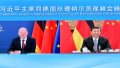 Chinese President Xi Jinping meets via video link with German Chancellor Olaf Scholz in Beijing, capital of China. Photo by Xinhua/Li Xueren.