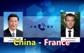 Xi talks with Macron over phone. Photo by Xinhua.
